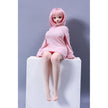2ft 60cm mini anime sex doll Azami. Silicone body construction, giant breasts, fair skin, pink hair and a sexy curvy body in a pink blouse.