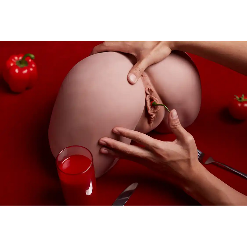 TPE sex doll butt with thighs pointed upwards with fair skin.