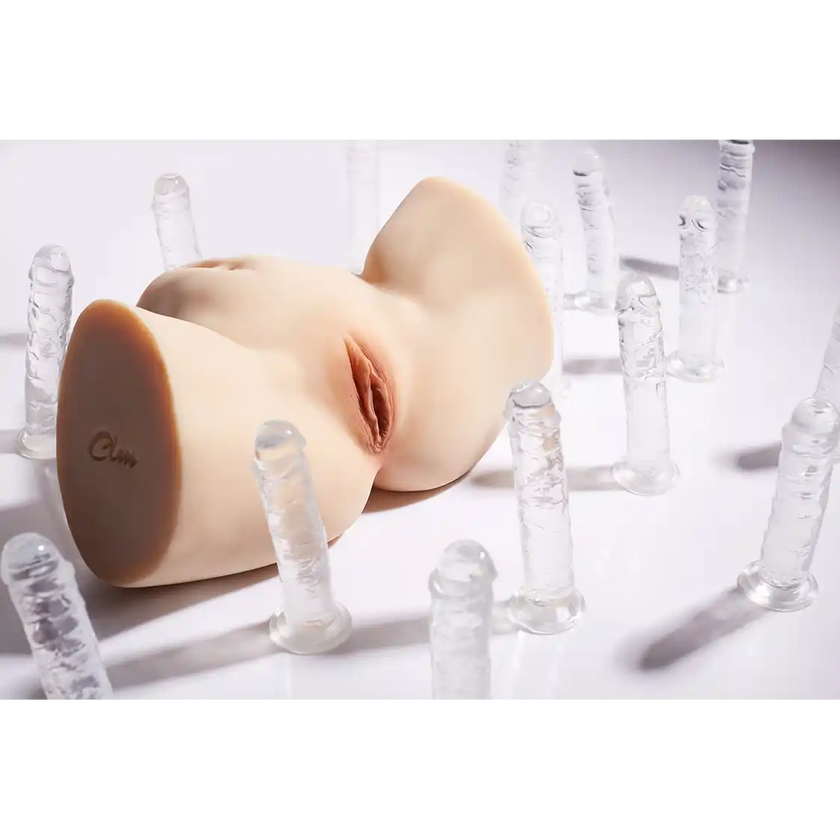 TPE sex doll butt with spread thighs with fair skin.