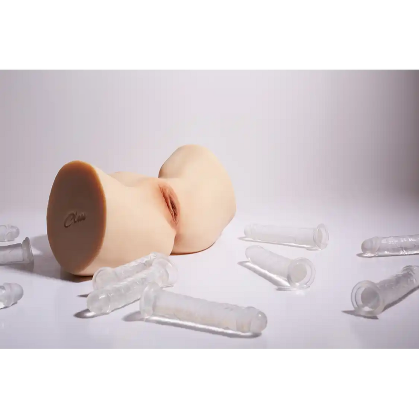 TPE sex doll butt with spread thighs with fair skin.