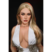 5ft 4in or 163cm tall life size silicone sex doll with long legs and long blonde hair in a white dress.