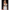 5ft 4in or 163cm tall life size silicone sex doll with long legs and long blonde hair in a white dress.