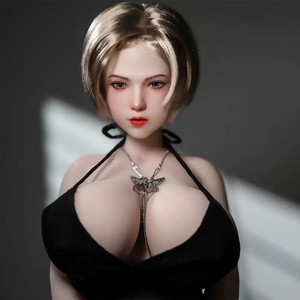 1ft 11in 60cm white female mini sex doll with blonde hair, light skin and extra large breasts.