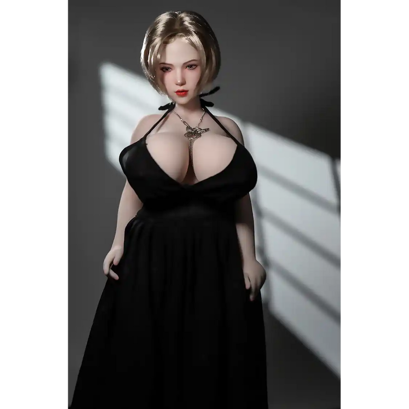 1ft 11in 60cm white female mini silicone sex doll with blonde hair, light skin and extra large breasts.