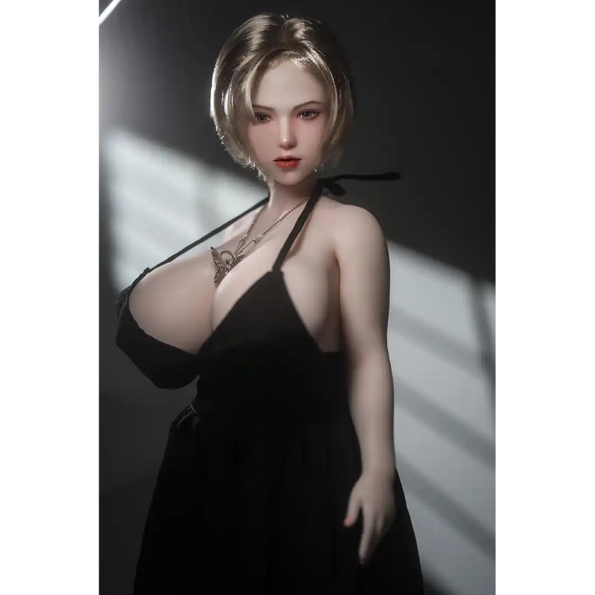 1ft 11in 60cm white female mini silicone sex doll with blonde hair, light skin and extra large breasts.