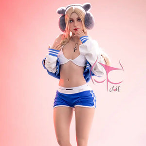 5ft 2in 159cm Caucasian female silicone sex doll with blonde hair, A-cup breasts and a slim athletic figure in small blue shorts and a letterman jacket.