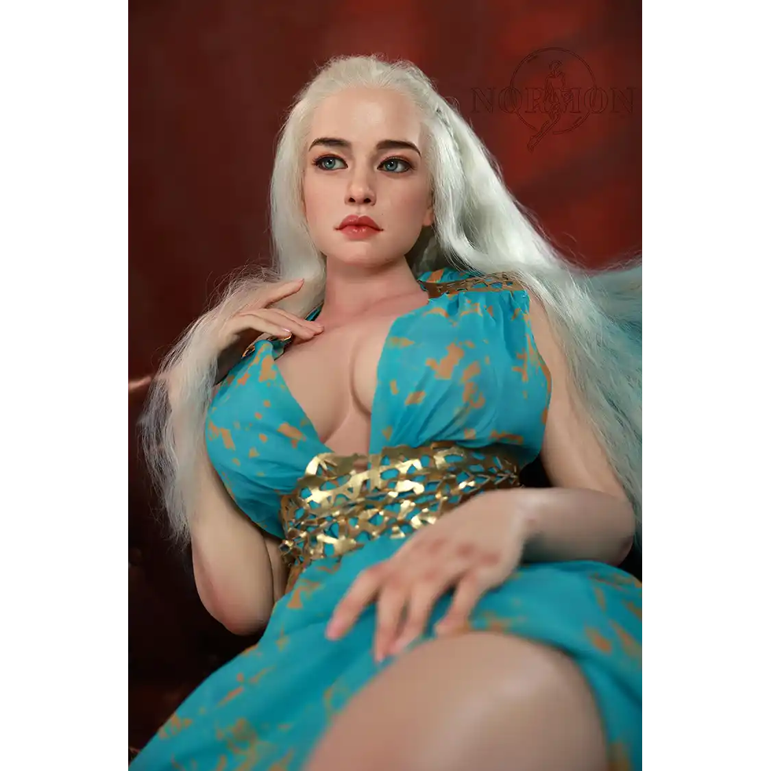 5ft 4in or 163cm tall life size, lifelike, Fantasy MILF silicone sex doll with long legs and long blonde hair in a blue fantasy dress.