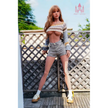 5ft 7in 170cm tall thin large breasted E-cup TPE sex doll with blonde hair, brown eyes and fair skin in a crop top and shorts.