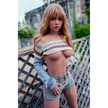 5ft 7in 170cm tall thin large breasted E-cup TPE sex doll with blonde hair, brown eyes and fair skin in a crop top and shorts.