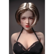 1ft 11in 60cm white female mini silicone sex doll with blonde hair, light skin and large breasts.