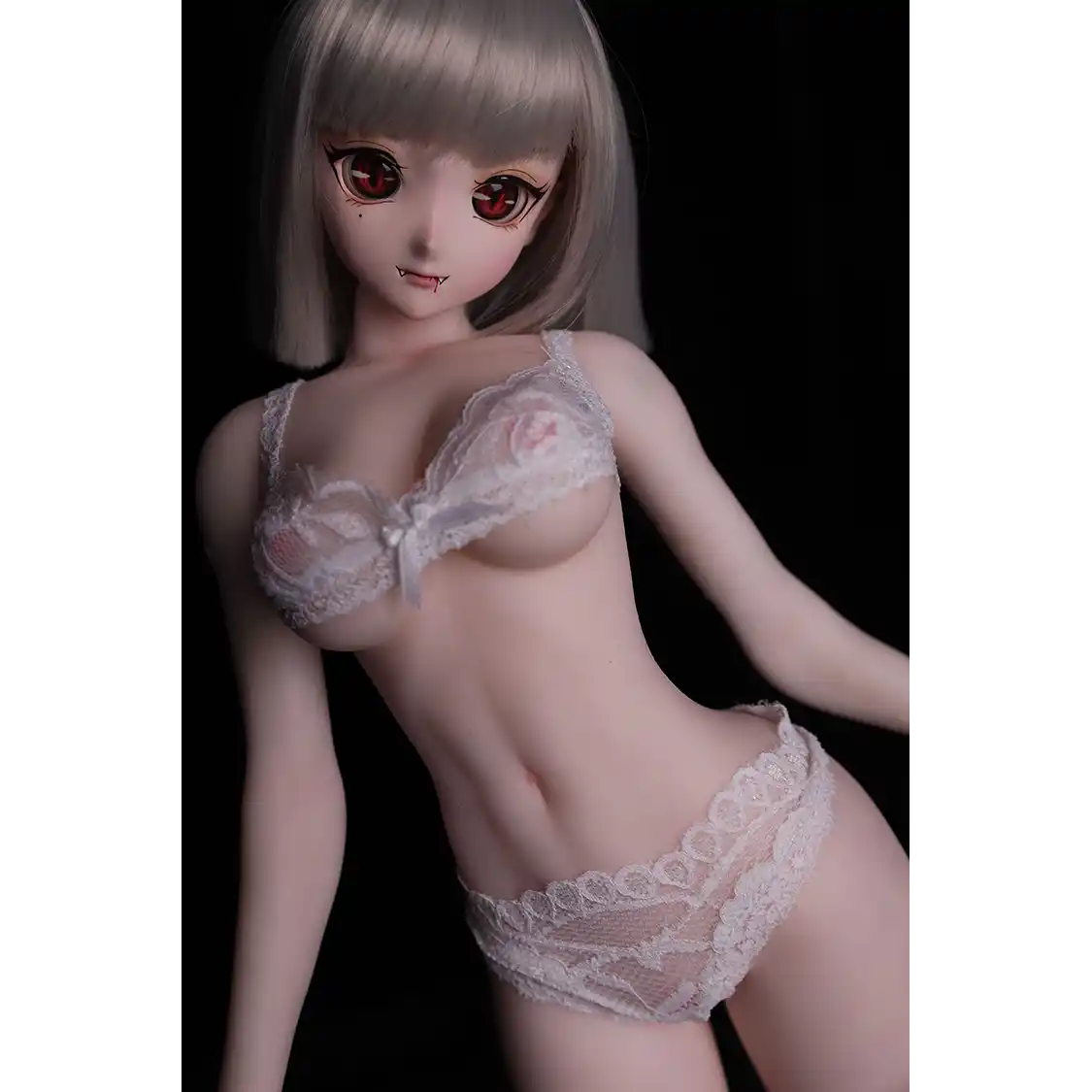 2ft 60cm anime style female mini silicone sex doll with medium breasts, tanned skin and a fit athletic body.