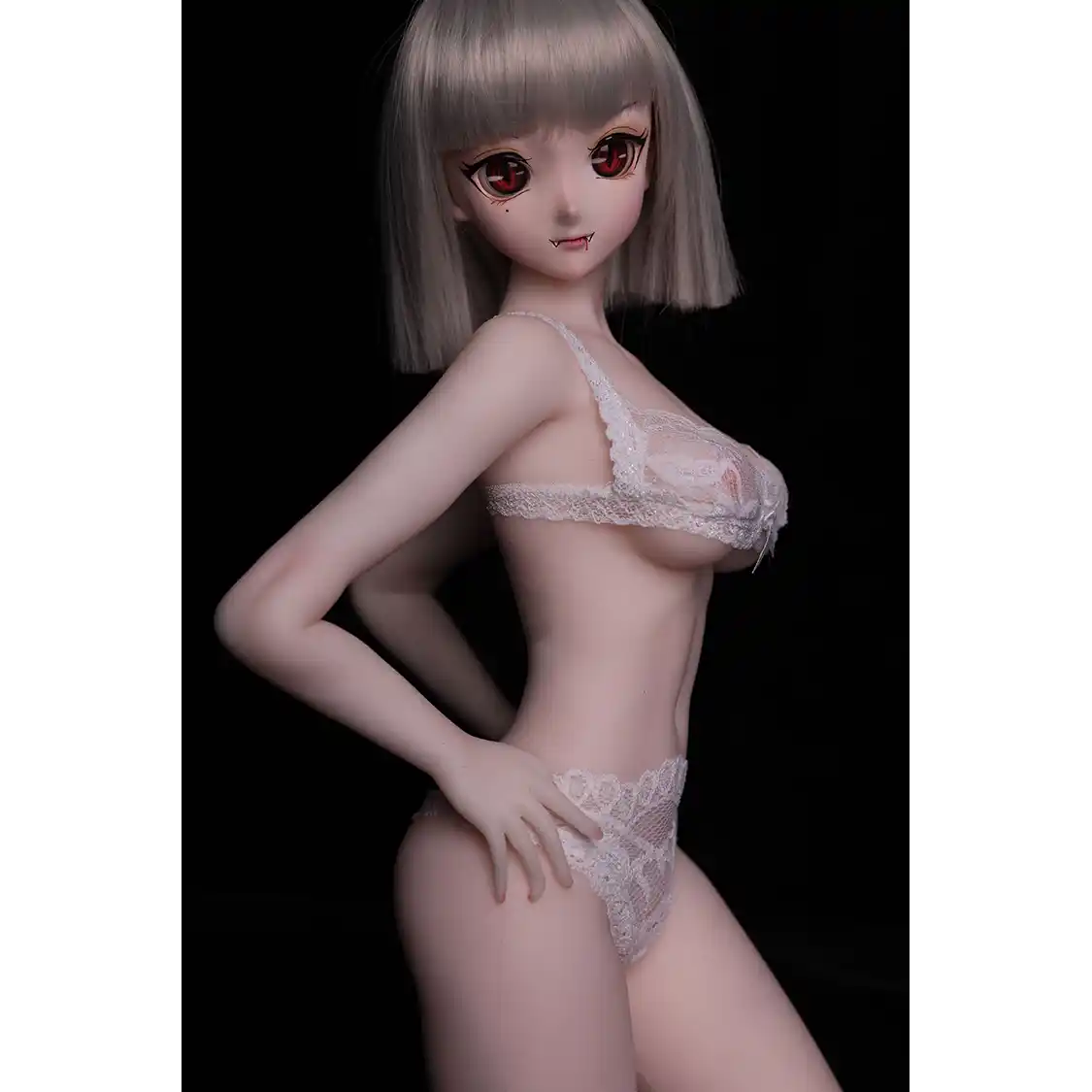 2ft 60cm anime style female mini silicone sex doll with medium breasts, tanned skin and a fit athletic body.