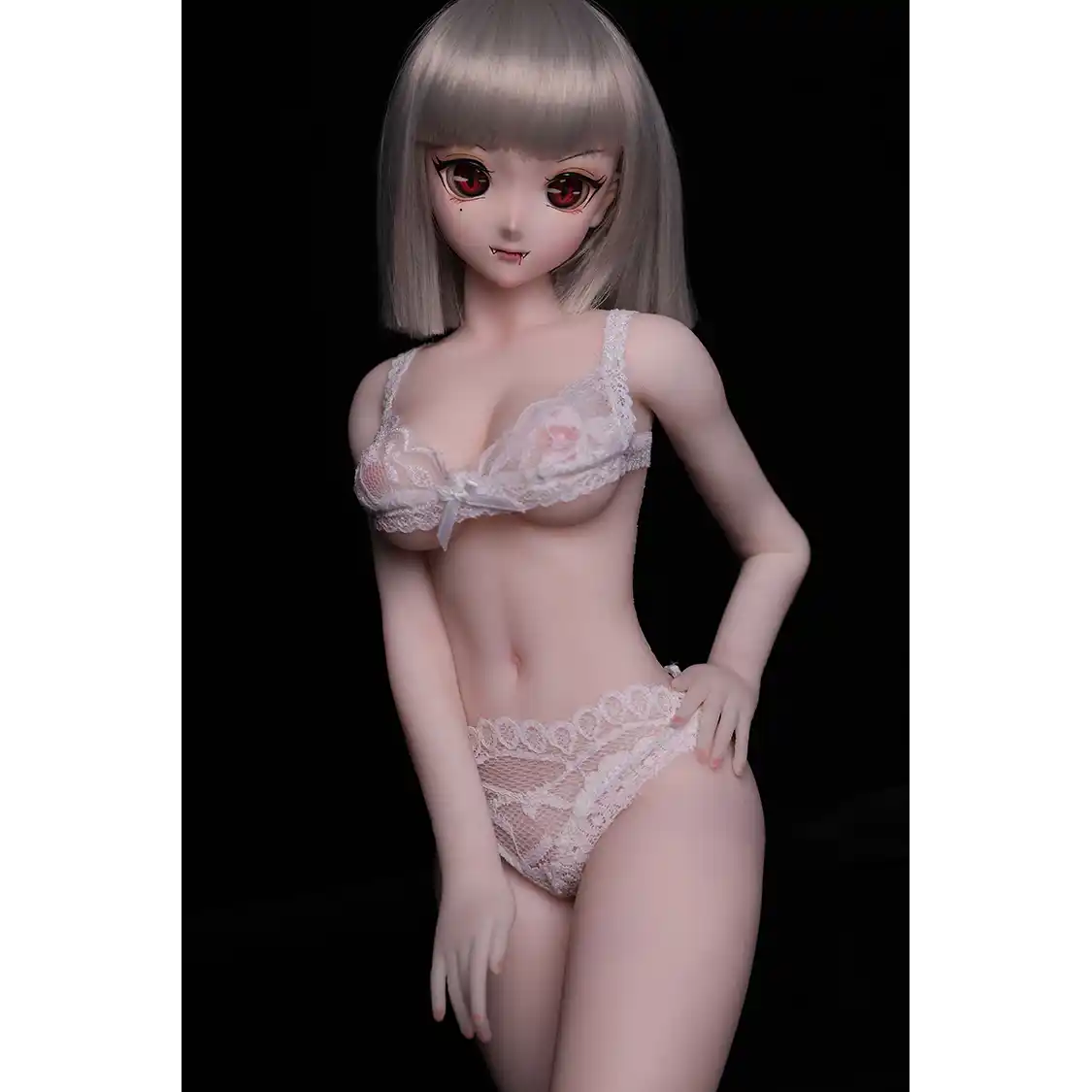 2ft 60cm anime style female mini silicone sex doll with medium breasts, tanned skin and a fit athletic body.