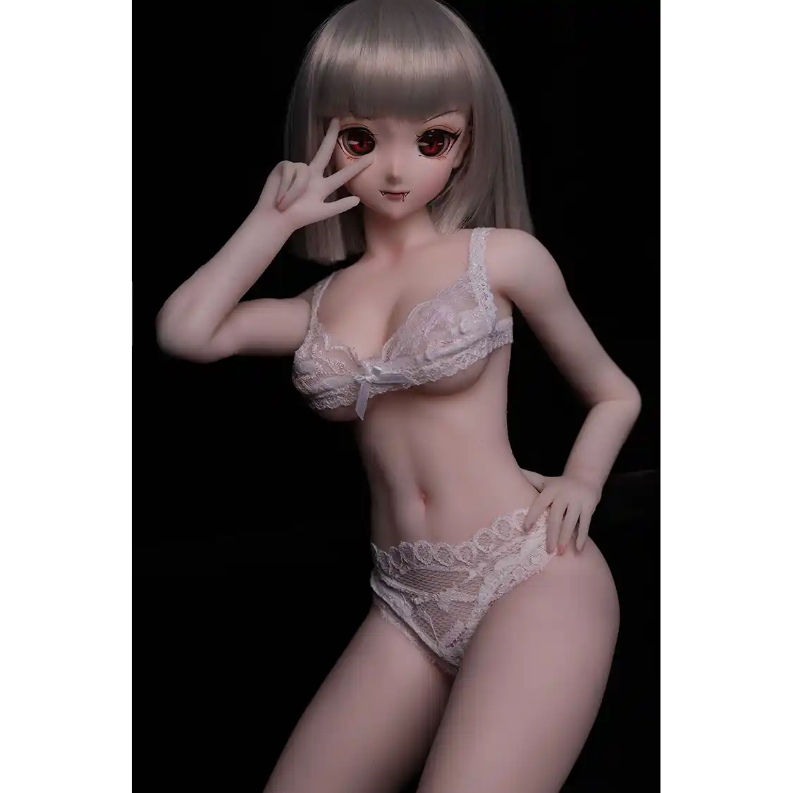 2ft 60cm anime style female mini silicone sex doll with medium breasts, tanned skin and a fit athletic body.