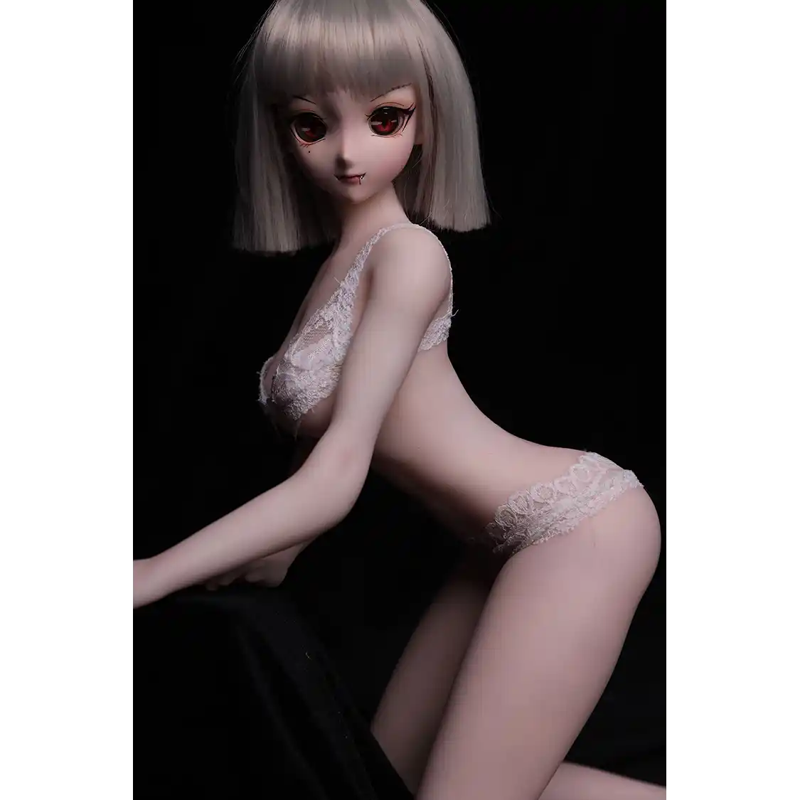2ft 60cm anime style female mini silicone sex doll with medium breasts, tanned skin and a fit athletic body.