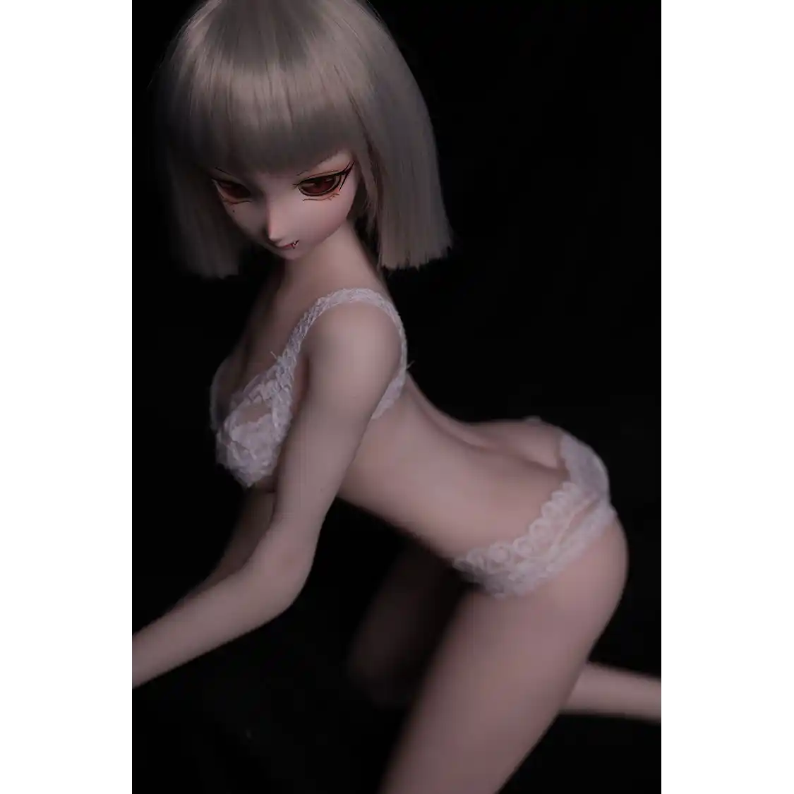 2ft 60cm anime style female mini silicone sex doll with medium breasts, tanned skin and a fit athletic body.