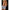 2ft 60cm mini anime sex doll Ikumi. Silicone body construction, giant breasts, fair skin, long blonde hair and a sexy curvy body in a grey skirt.
