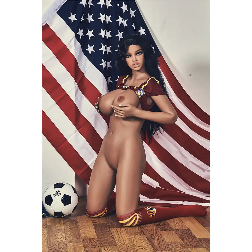 5ft 4in 163cm curvy athletic TPE sex doll with G cup breasts in a soccer outfit with long wavy black hair.