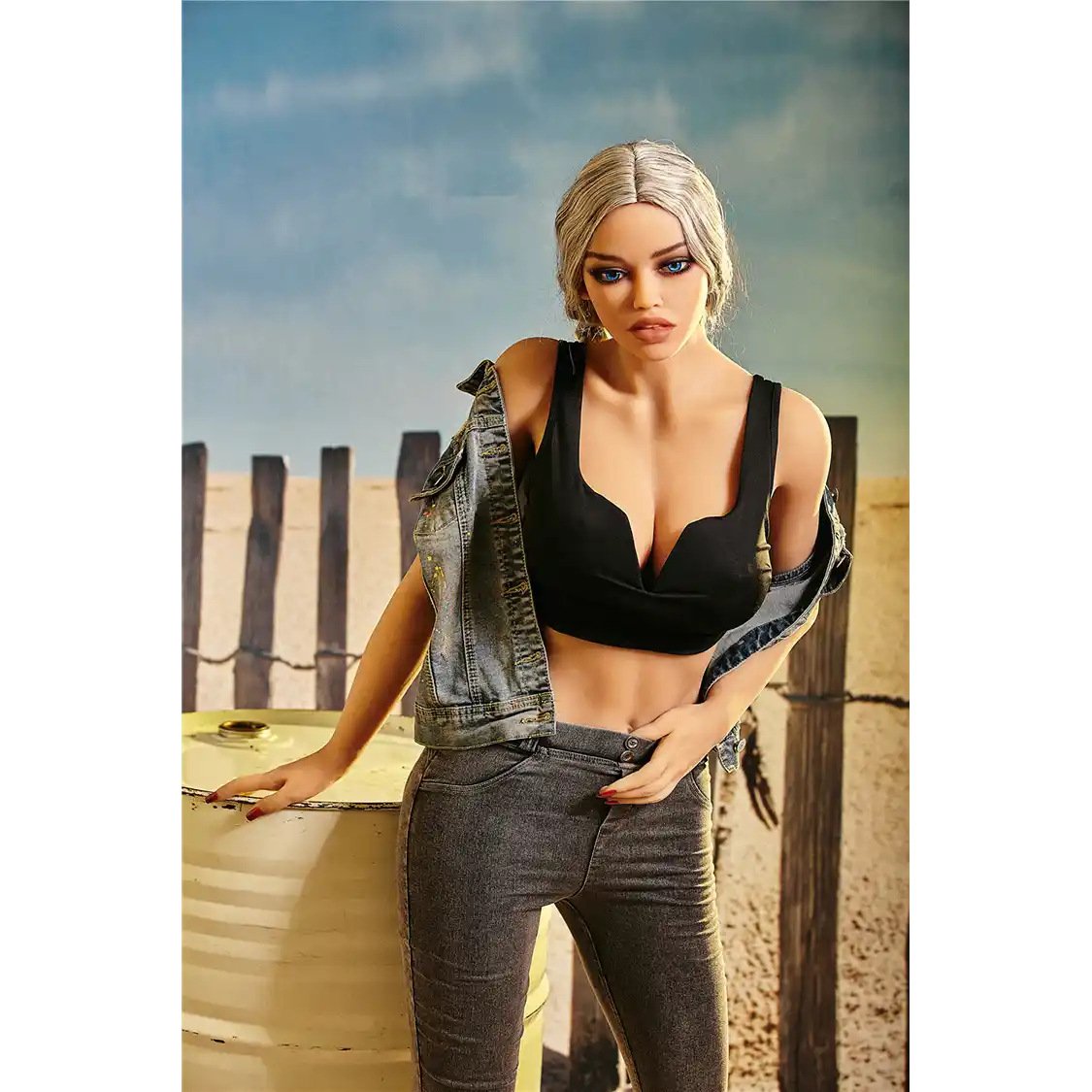 5ft 3in 159cm curvy black TPE sex doll with long braided blonde hair, large E cup breasts and blue eyes in a western outfit.