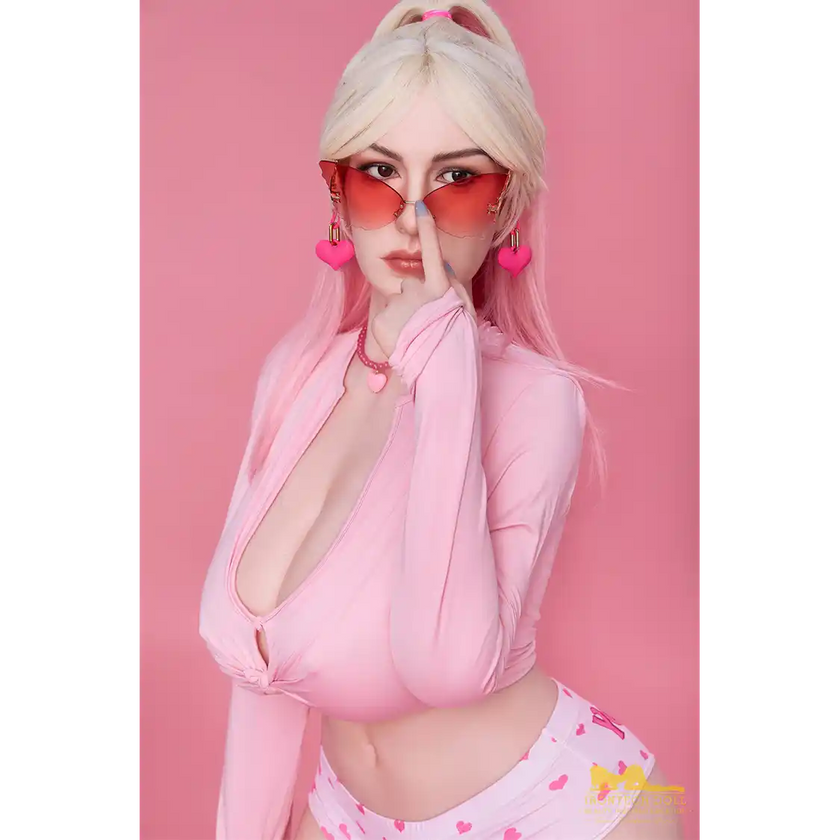 5ft 4in or 162cm curvy silicone sex doll with long legs, long blonde hair, very large breasts, big butt and brown eyes in a pink outfit.