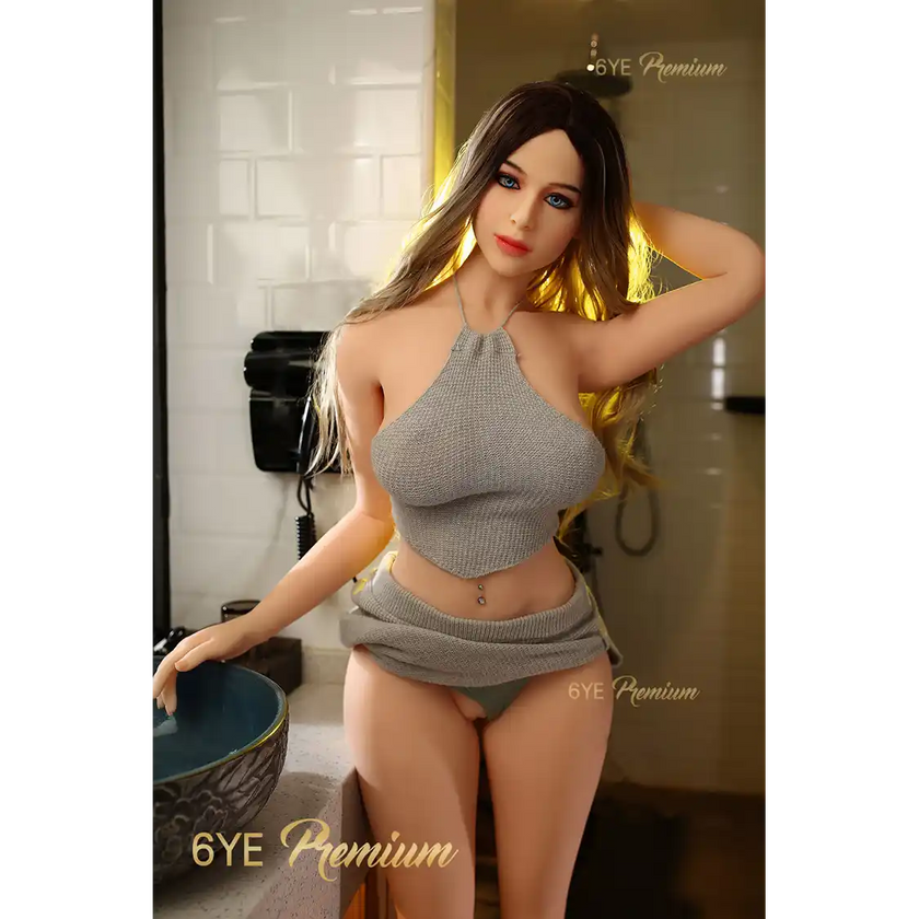 5ft 4in 163cm slim white female sex doll with long blonde hair, fair skin, and C-cup breasts in a grey top and skirt.Made by 6ye.