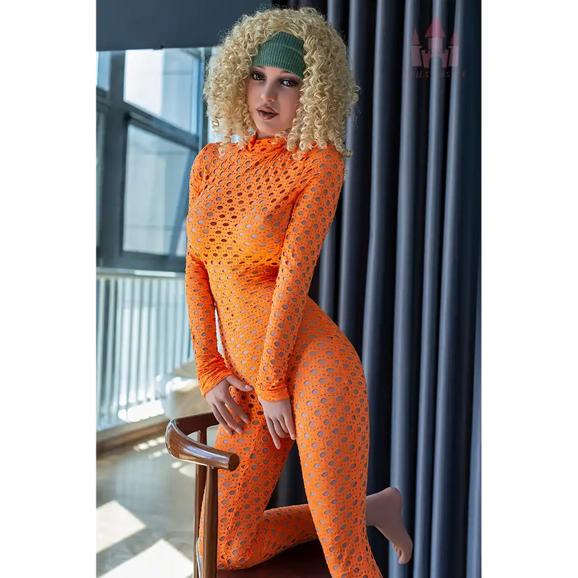 5ft 4in 163cm tall curvy blonde TPE sex doll with large E-cup breasts, brown eyes and curly blonde hair.