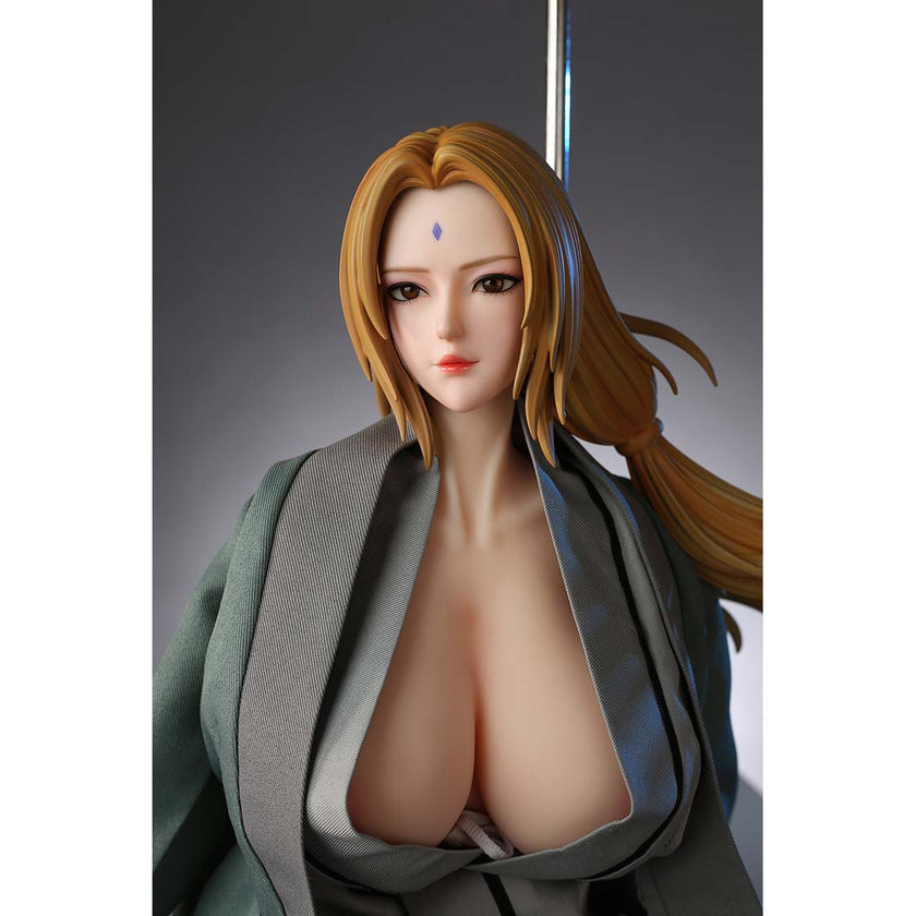 2ft 01in 65cm mini silicone anime sex doll with blonde hair, light skin and very large breasts.  Made by AF Doll.