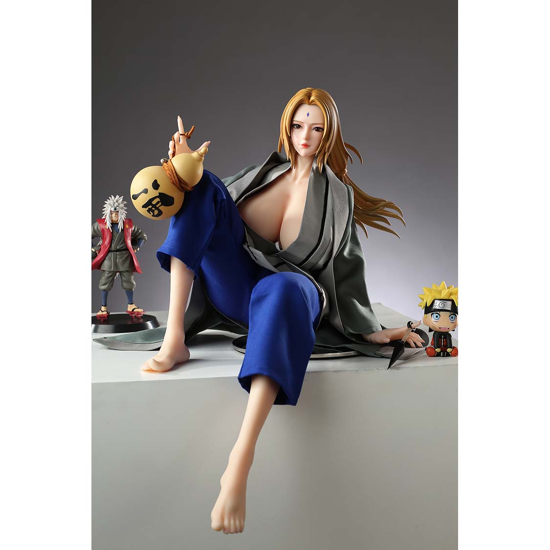 2ft 01in 65cm mini silicone anime sex doll with blonde hair, light skin and very large breasts.  Made by AF Doll.