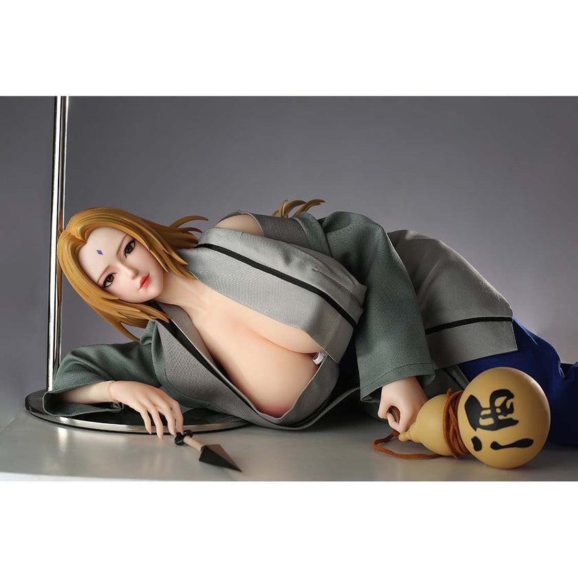 2ft 01in 65cm mini silicone anime sex doll with blonde hair, light skin and very large breasts.  Made by AF Doll.