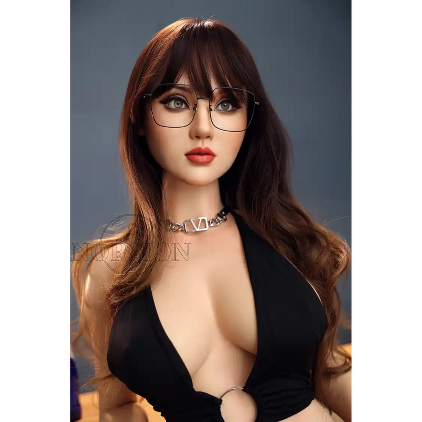 5ft 4in or 163cm tall life size silicone sex doll with long legs and long brown hair in jeans and a black top.