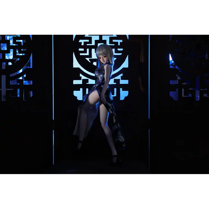 2ft 60cm anime style female mini silicone sex doll with medium breasts, light skin and a fit athletic body in a chinese dress.