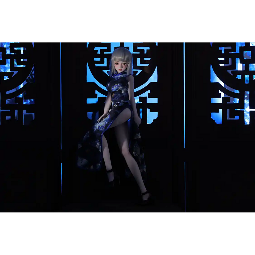 2ft 60cm anime style female mini silicone sex doll with medium breasts, light skin and a fit athletic body in a chinese dress.