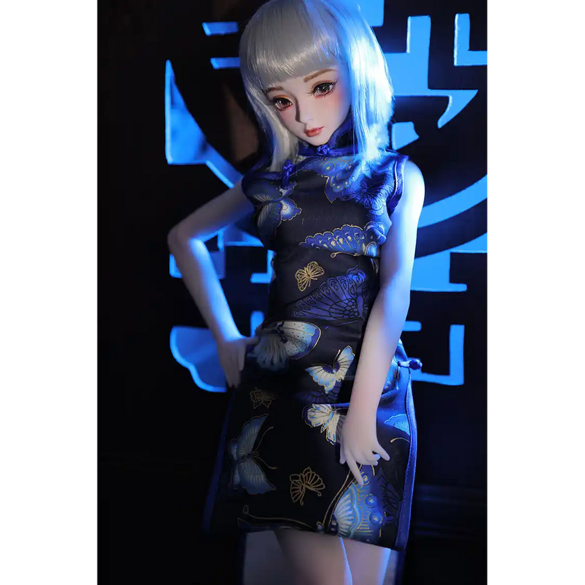 2ft 60cm anime style female mini silicone sex doll with medium breasts, light skin and a fit athletic body in a chinese dress.