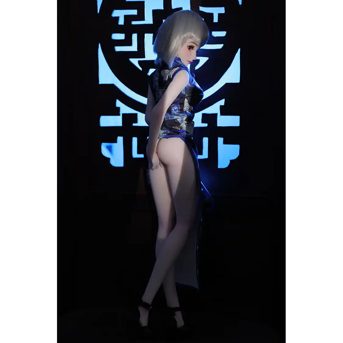 2ft 60cm anime style female mini silicone sex doll with medium breasts, light skin and a fit athletic body in a chinese dress.