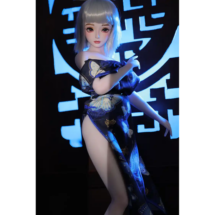 2ft 60cm anime style female mini silicone sex doll with medium breasts, light skin and a fit athletic body in a chinese dress.