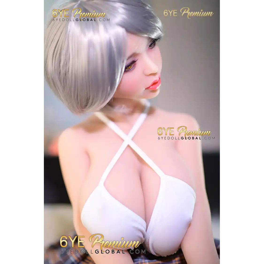 3ft 5in 105cm petite sex doll with silver hair fair skin, and large breasts in a revealing white top and plaid skirt.Made by 6ye.