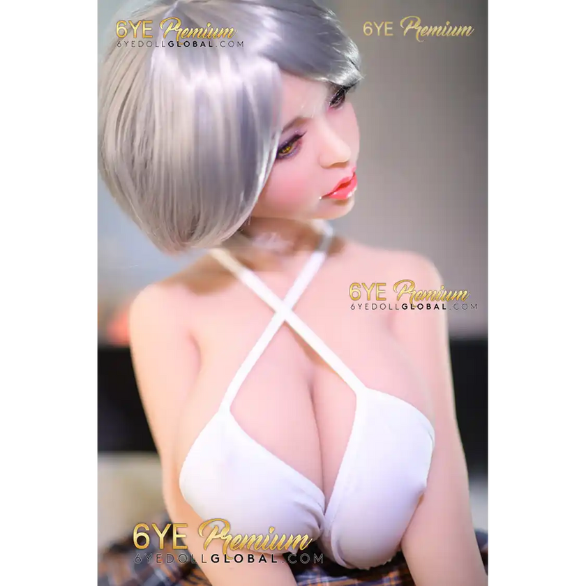 3ft 5in 105cm petite sex doll with silver hair fair skin, and large breasts in a revealing white top and plaid skirt.Made by 6ye.