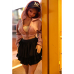 1ft 11in 60cm anime style female mini silicone sex doll with red hair, light skin and large breasts.