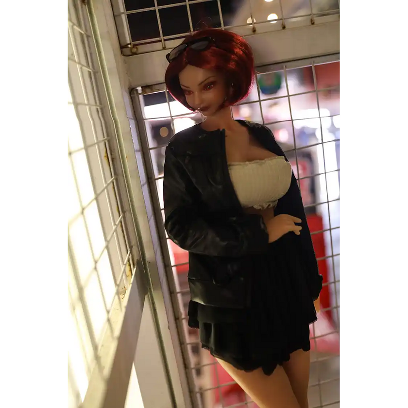1ft 11in 60cm anime style female mini silicone sex doll with red hair, light skin and large breasts.