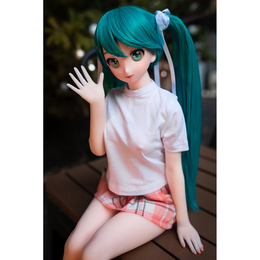 2ft 60cm mini anime sex doll Kurumi. Made of silicone featuring large breasts, fair skin, long blue hair and a fit athletic body in a skirt and t-shirt.