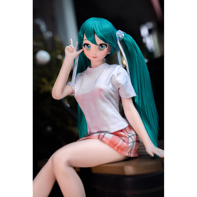2ft 60cm mini anime sex doll Kurumi. Made of silicone featuring large breasts, fair skin, long blue hair and a fit athletic body in a skirt and t-shirt.