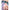2ft 60cm mini anime sex doll Kurumi. Made of silicone featuring large breasts, fair skin, long blue hair and a fit athletic body in a skirt and t-shirt.