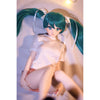 2ft 60cm mini anime sex doll Kurumi. Made of silicone featuring large breasts, fair skin, long blue hair and a fit athletic body in a skirt and t-shirt.