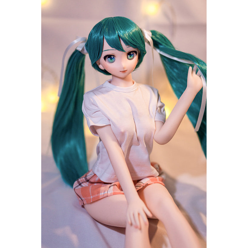 2ft 60cm mini anime sex doll Kurumi. Made of silicone featuring large breasts, fair skin, long blue hair and a fit athletic body in a skirt and t-shirt.