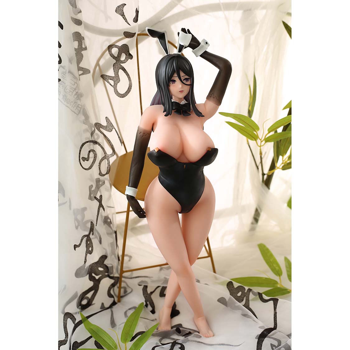 1ft 06in 45cm anime style mini silicone sex doll with black hair, light skin and large breasts.