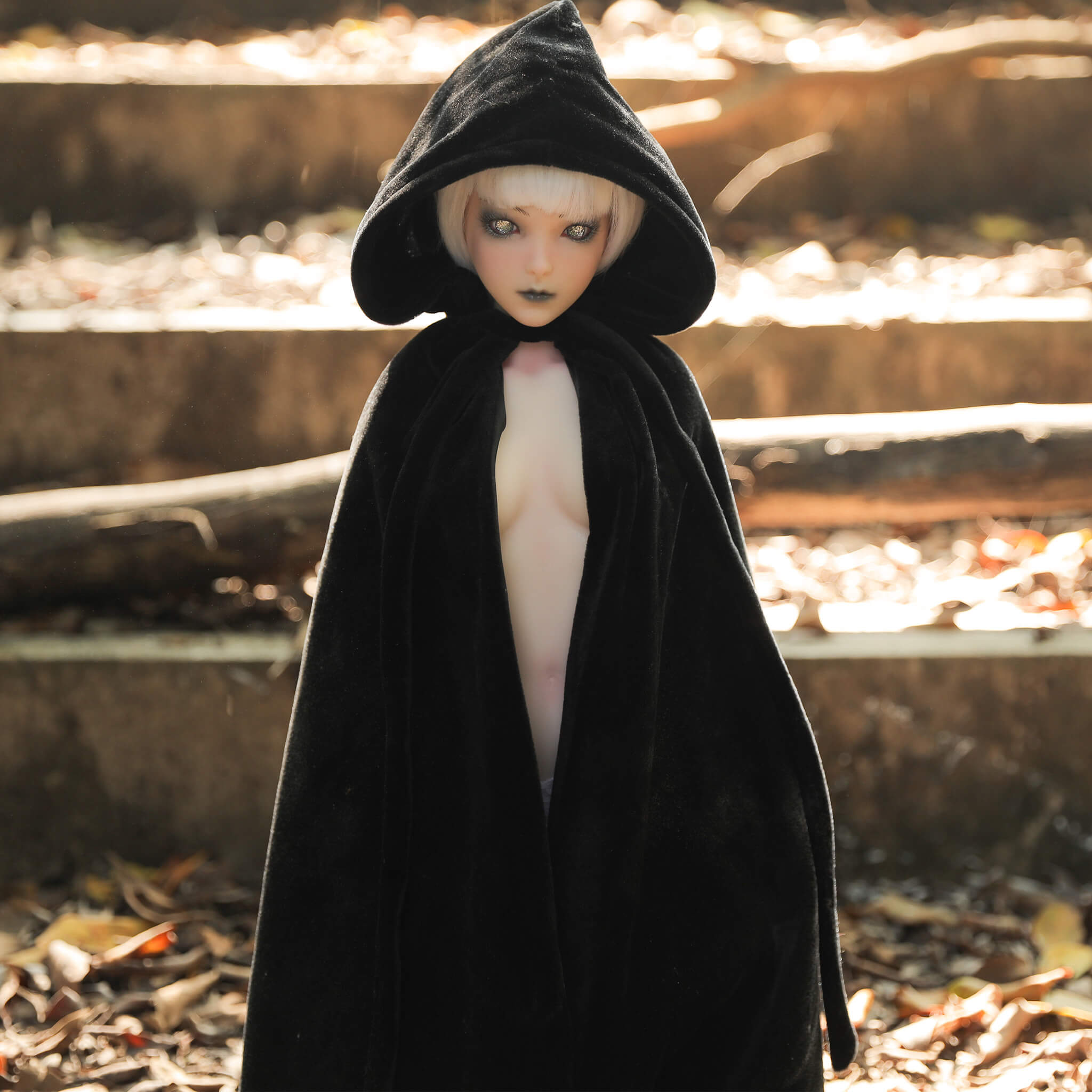 2ft or 60cm tall mini silicone sex doll Momoko.  Momoko is a mini elf sex doll made by climax doll with diamond eyes, white hair and white skin tone.