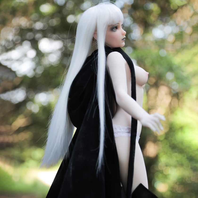 2ft or 60cm tall mini silicone sex doll Momoko.  Momoko is a mini elf sex doll made by climax doll with diamond eyes, white hair and white skin tone.