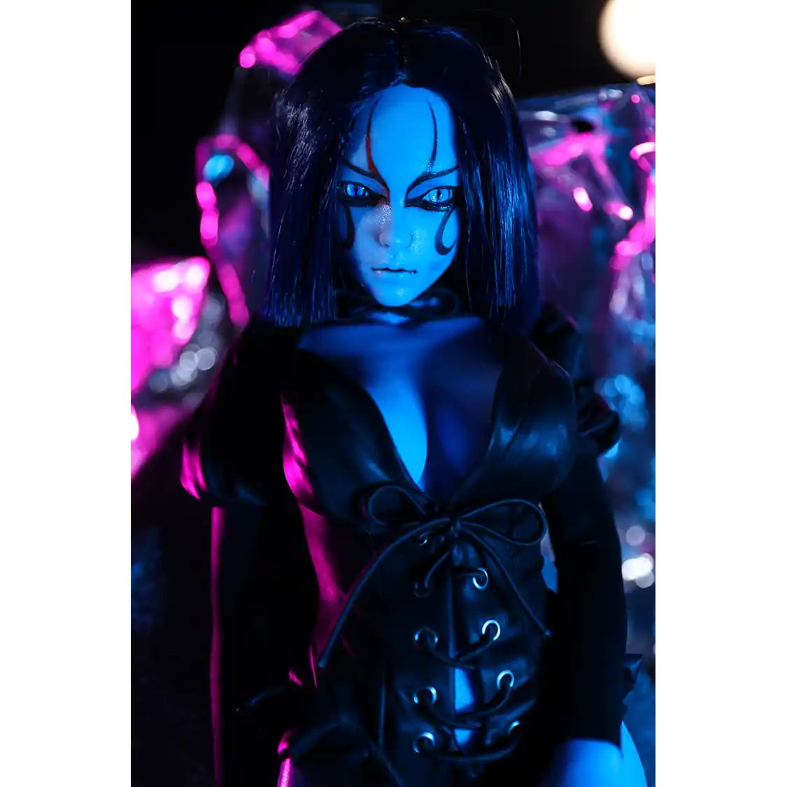 1ft 11in 60cm anime style female elf mini silicone sex doll with black hair, blue skin and large breasts.