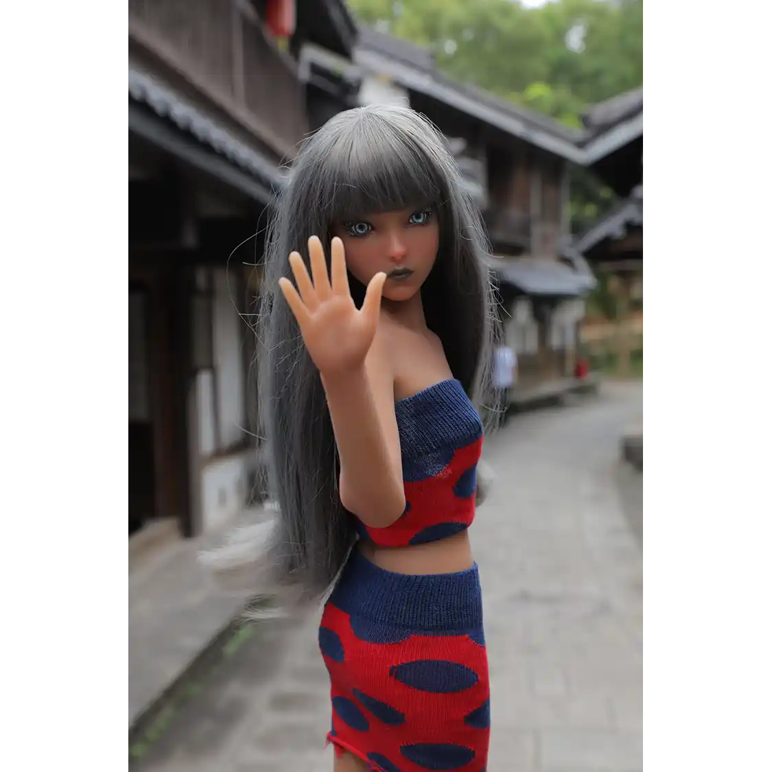 1ft 11in 60cm affordable mini female silicone sex doll with silver hair, blue eyes small breasts and a slim athletic figure.