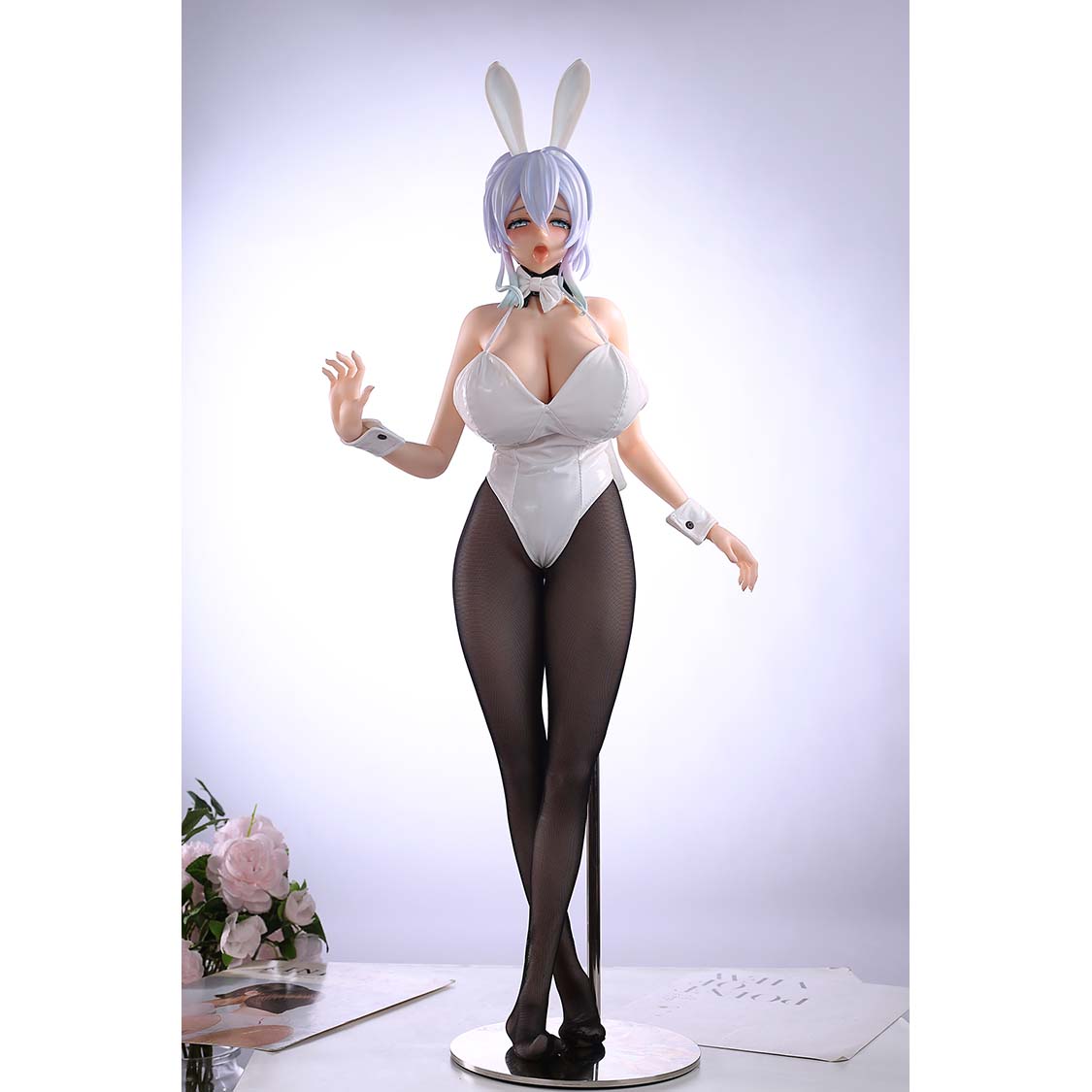 2ft 01in 65cm mini silicone anime sex doll with purple hair, light skin and very large breasts.  Made by AF Doll.